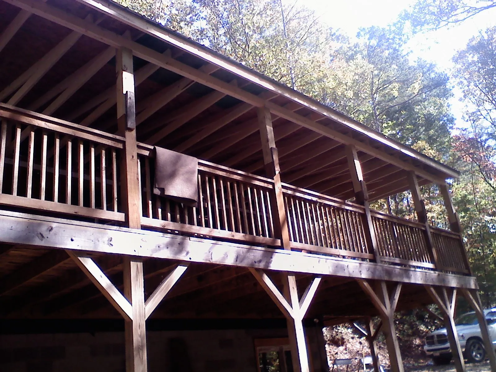 Timber framing under a new elevated porch and deck — Roof Leak Repair in Cerrillos by Roofing Brothers